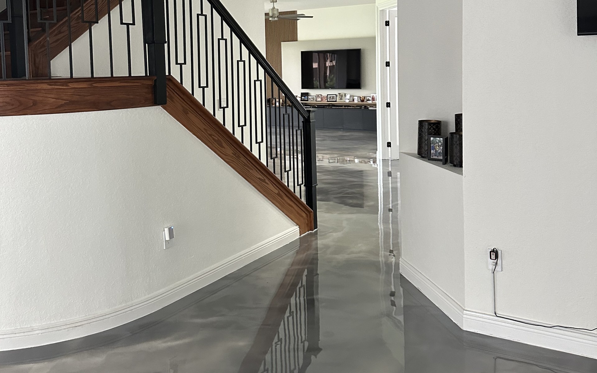 Metallic epoxy floor with custom mural wall